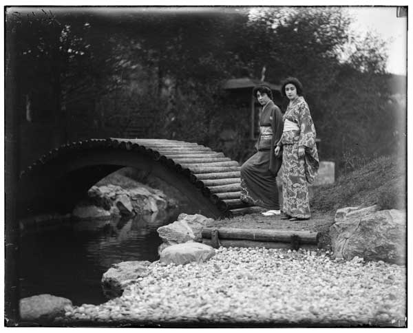 Japanese Garden.
Japanese women at curved bridge.