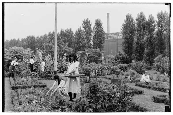 Formal Garden.
Flower picking by students, 1923.