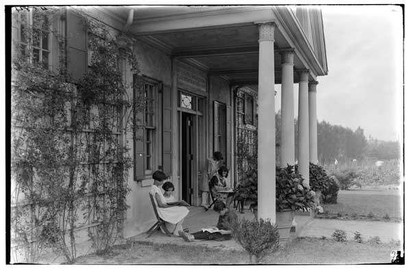 Children's Garden House.  1923.
5 children reading on the porch.