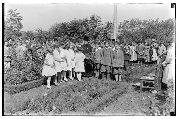 Children's Garden.
Mrs. Glentworth Butler with group at flagpole, 1924.