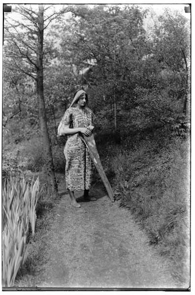 Bolivia.
Bark cloth (Coroche) and marico (Tacoma Indians, Bolivia).  Posed by C. Van Brunt in Japanese Garden.