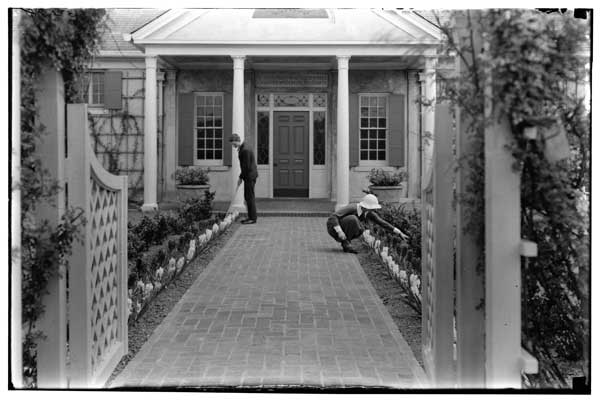 Walk and Border.  Children's Garden from Rose Arch, 1925.
Maud Hickok and Robert Van Riper at work.