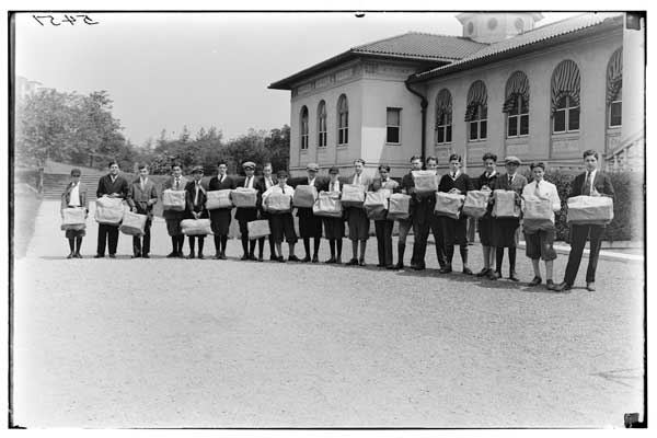 Seeds.
Group of 20 boys with bundles of penny-packets.