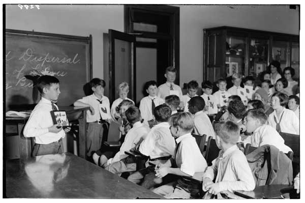 P.S. 206-Group at BBG teaching classmates-1931.  Nature study-P.S.206.  A small group of children teaching their classmates.