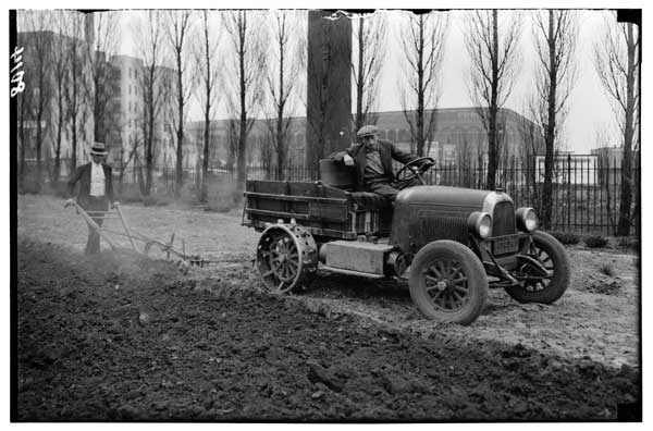 Children's Garden:
Plowing of, with tractor.
